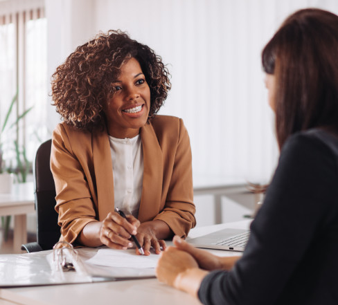 Woman consulting with a female manager